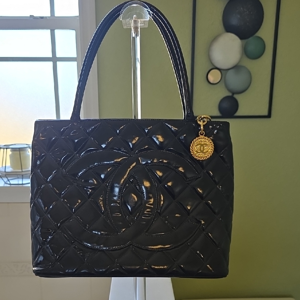 CHANEL Black Quilted Patent Leather Shoulder Bag with Gold Medallion Authentic